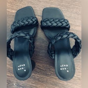 A New Day never been worn black braided sandals!